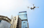 drone flying over city